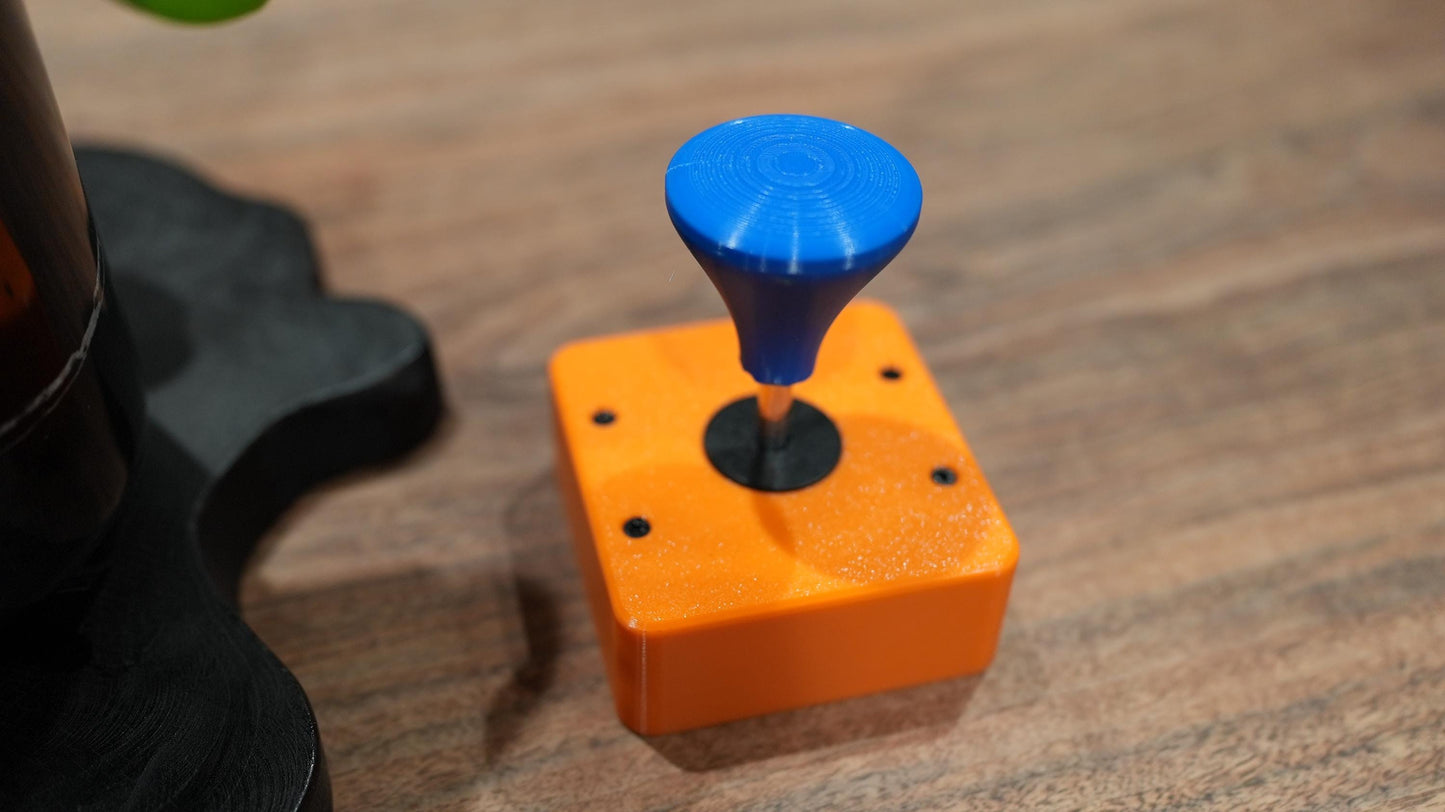 Assistive Joystick with Adjustable Band