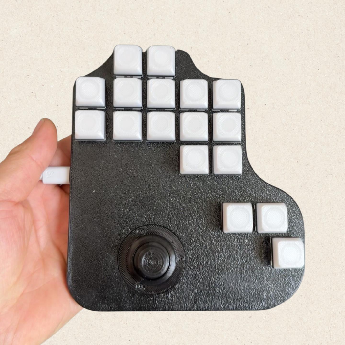 Keyboard with Joystick in Palm
