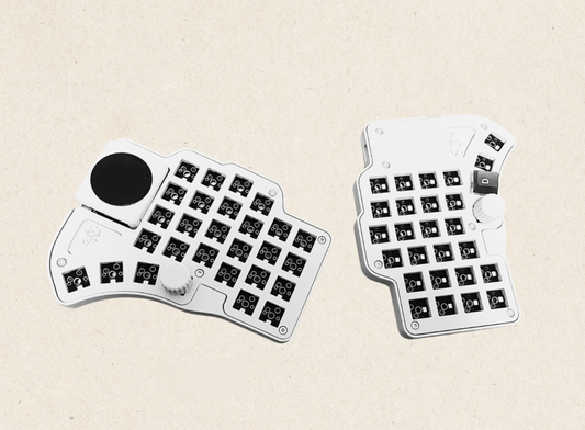 Dilemma Max - split keyboard with a trackpad 
- Hot-swappable
- Supports VIA&VIAL key change
- Switches: mx, choc v1 and v2 (It takes 5 days longer to make it with choc switches)
- Two knob positions
- Touchpad supports mouse movement, scroll wheel simulation and left single click
- Headphone cable: USB-C to C
- no RGB bottom light
- Keycaps color: only WHITE available
DIY kit: KIT ONLY. Note that keycaps and switches not included. 
Ready to use kit: Hot-swappable No Soldering
