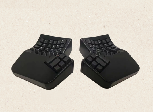 🔧 Key Features:
• 2.4G Wireless Split Design – Truly wireless, no cables between halves
• Hot-Swappable PCBs – Easily install or swap mechanical switches (no soldering)
• Vial Programmable – Fully open Vial support for powerful customization
• Made-to-Order – Production starts after order
• FDM 3D Printed Shell – PLA by default; slight print texture and imperfections are normal

⚙️ Vial Features (Fully Enabled):
• 10 layers
• 32 Macros, 32 Tap Dance keys, 32 Combos, 32 Key Overrides
• Full QMK settings sup