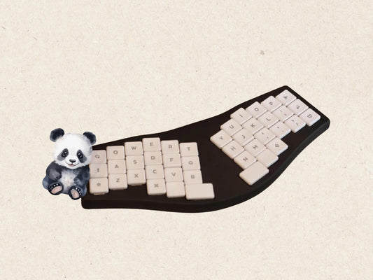 🧠 42-Key Compact Layout – Minimal yet functional for everyday use
⚡ ZMK Firmware – Fully wireless with support for ZMK Studio & web remapping
🔌 Hot-Swappable PCB – Compatible with Kailh Choc V1 low-profile switches
📏 1.2mm FR4 Positioning Plate – Durable and lightweight
🔋 250mAh Rechargeable Battery – Optimized for low power usage

📦 What’s Included:
Left & right 3D printed cases 
Hot-swappable 42-key PCB (compatible with Choc V1 switches)
FR4 positioning plate (1.2mm)
250mAh battery
Pre-flashed ZMK